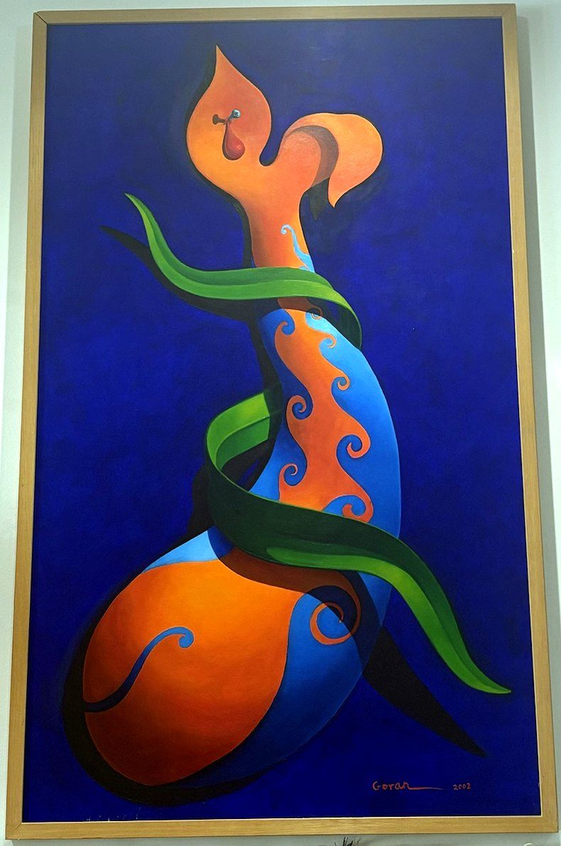 Afsana VII by Goran Baba Ali: an abstract orange and blue figure wrapped in a green ribbon on a deep blue background